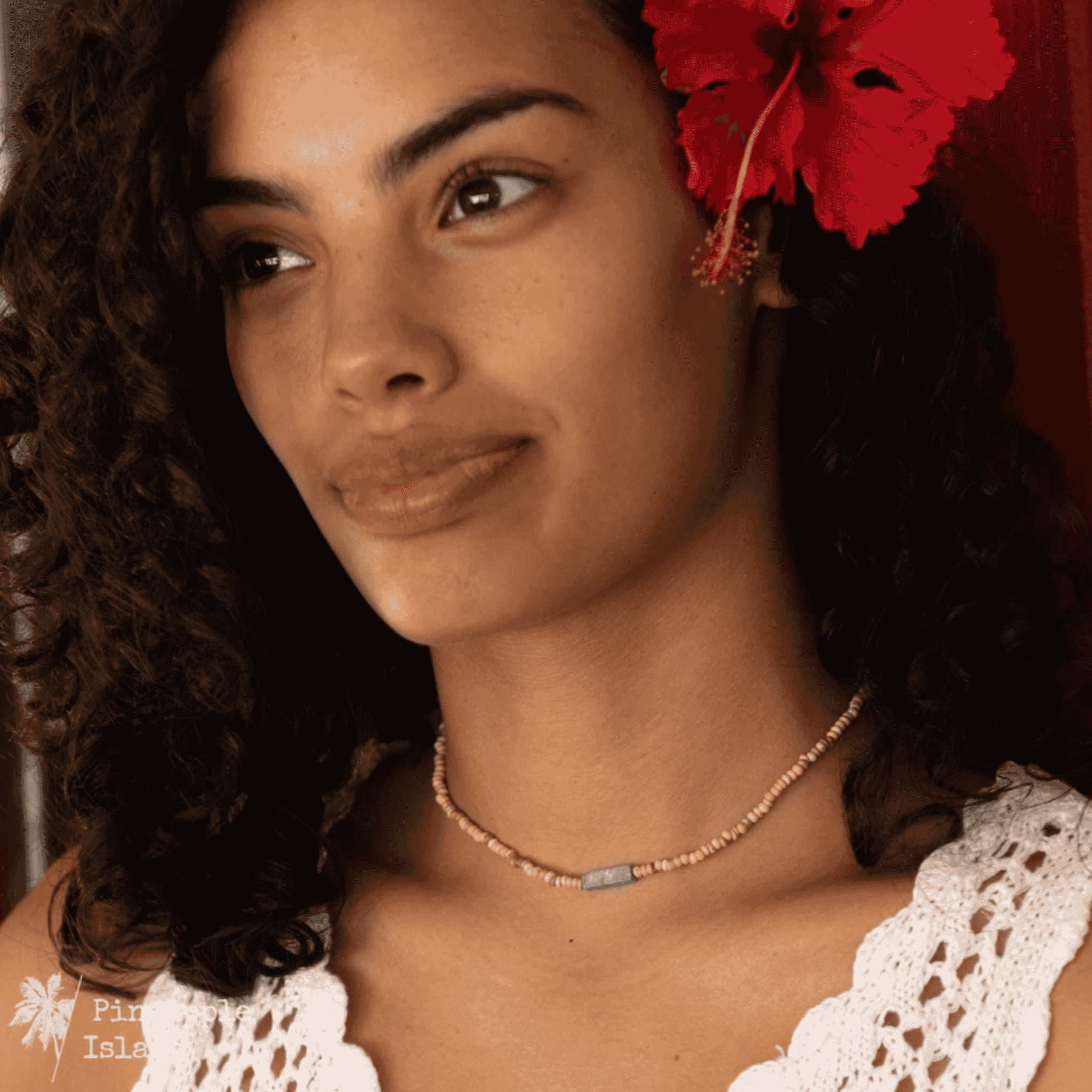 A choker and anklet duo featuring coconut wood beads and a natural stone with organic veining. The choker evokes tropical breezes, while the Bali-crafted anklet, with a double-beaded design and adjustable wax polyester pull-string, offers a bohemian, carefree fit. Perfect for adventurous souls embracing the rhythm of the waves.