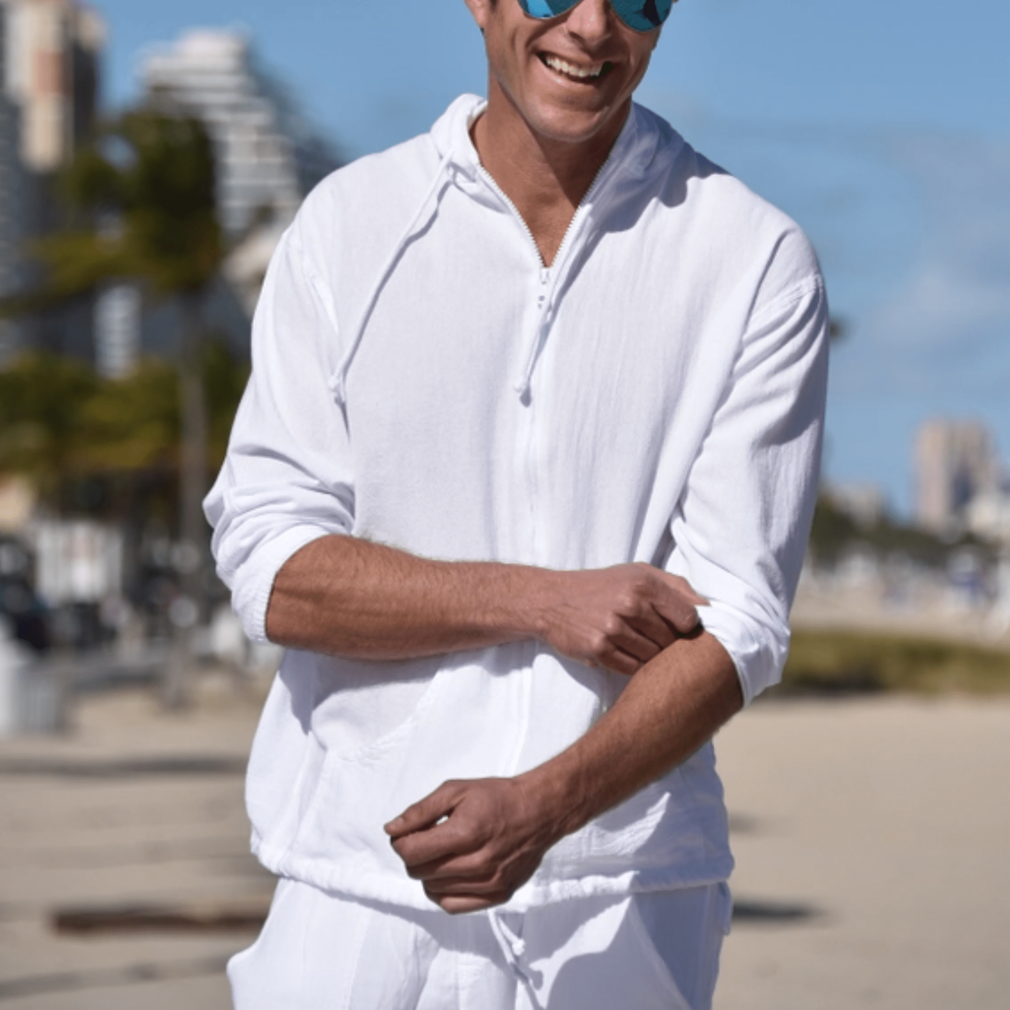 The Island Hoodie made from ultra-soft, breathable Cotton Natural fabric, featuring a relaxed fit and a convenient zippered front. Ideal for layering or casual wear, this versatile hoodie combines comfort and style for any season.