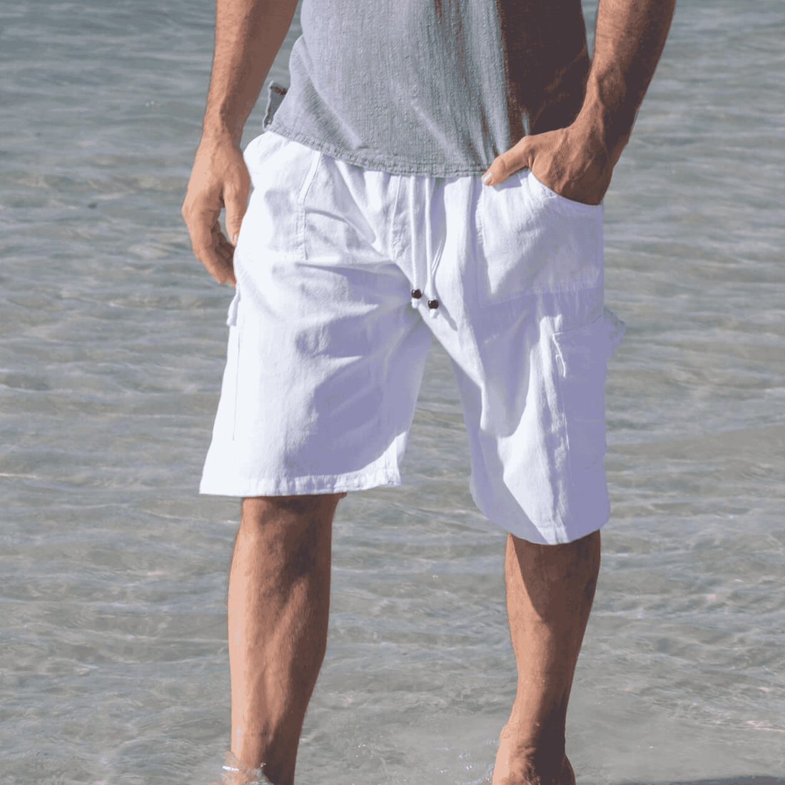 The Marina Shorts made from soft, breathable Cotton Natural fabric, featuring an elastic waistband with adjustable drawstring beads for a custom fit. Designed for comfort, these shorts also have front pockets, offering both style and practicality for everyday wear.